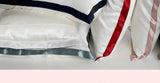 Chroma Chic: White Silk Pillowcase with Colorful Accents