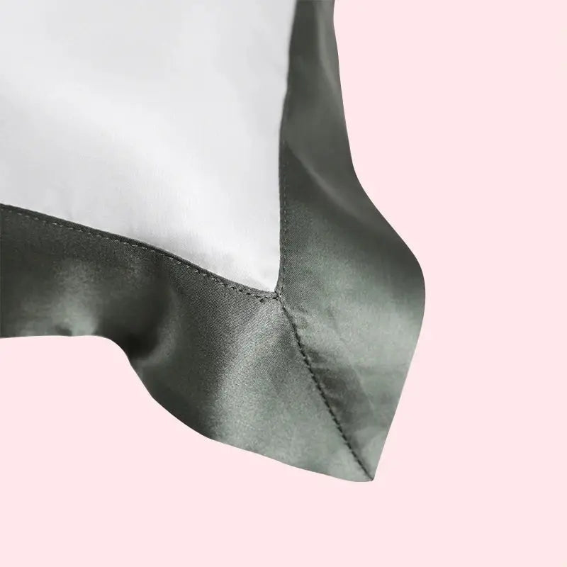 Chroma Chic: White Silk Pillowcase with Colorful Accents